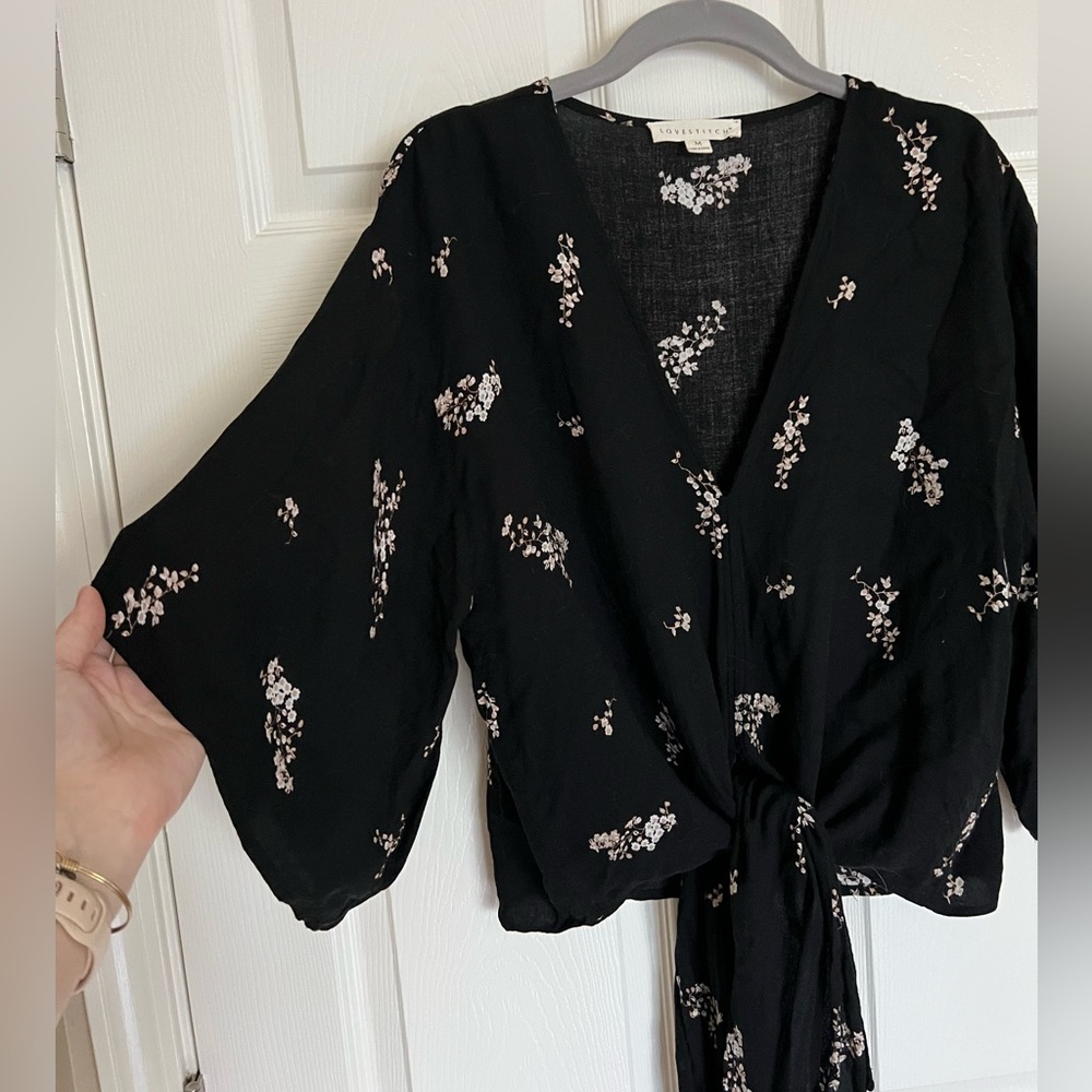 Black V neck flutter sleeve top